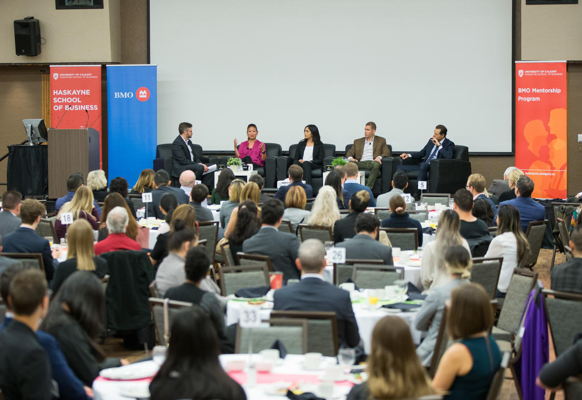 Adam Legge, director of the Global Business Futures Initiative at Canadian Centre for Advanced Leadership in Business moderates a panel discussion of mentors and mentees. 