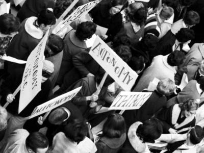 Students at the University of Alberta in Calgary gather in the library foyer and sing for autonomy in 1963. UARC 7.11 by Calgary Herald