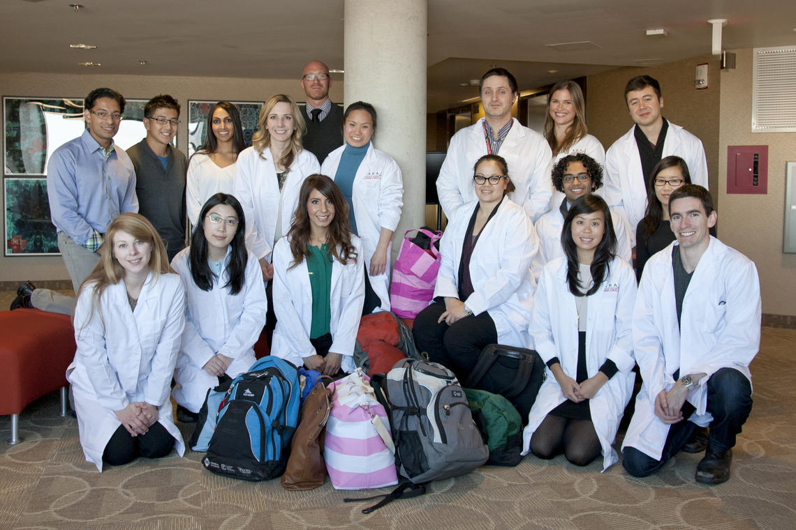 Medical residents collected bags and backpacks filled with necessities for Alberta’s homeless population. LEFT SIDE: Front row, from left: Nicole Delaney, Guan Huang, Gurbir Brar. Middle row, from left: Rithesh Ram, Justin Wong, Priyanka Mysore, Natalie Logie, Gillian Shiau. Back row: David Weatherby. RIGHT SIDE: Front row, from left: Natalia Ng, Stephen Annand. Middle row, from left: Brandi Iio, Debraj Das, Serena Siow. Back row, from left: Mark Ballard, Jennifer Leighton, Gregory Eustace.  