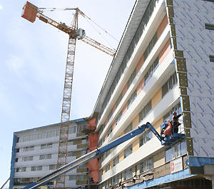 Workmen are entering the home stretch on the Fok Ying Tung International House construction.