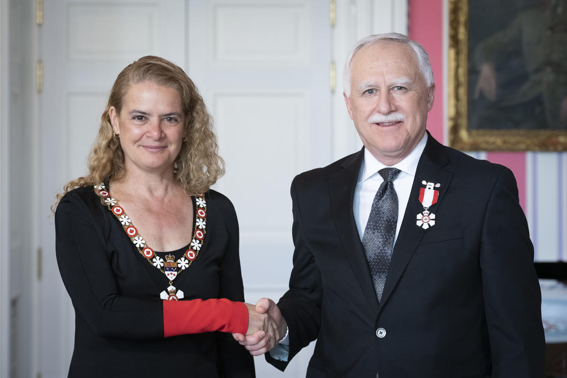 Governor General Julie Payette invests University of Calgary professor John Conly as a Member of the Order of Canada at the May 8, 2019 ceremony in Ottawa.