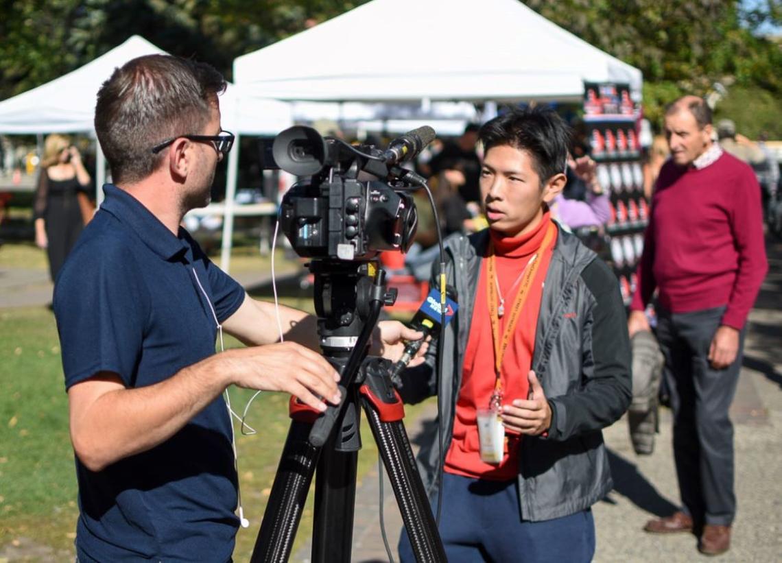 Bill Zheng interviewed by Global News at Sept. 27 Pop Up Care Village.