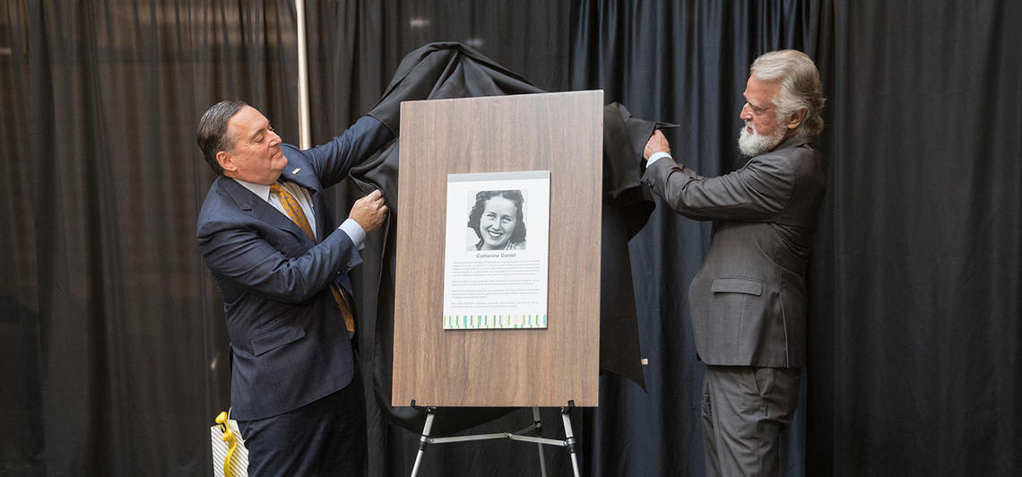 OWN.CANCER Campaign Co-Chair John Osler (left) and philanthropist Patrick Daniel unveil a plaque in honour of the Daniel Family Foundation's gift