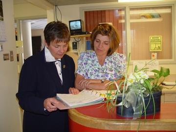 Barb Shellian at desk.