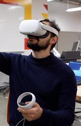 A man wears a VR headset