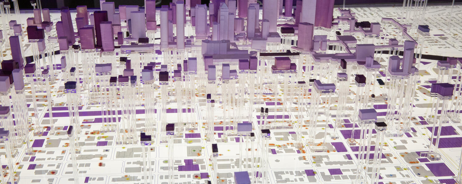 A purple and white model of the city of Calgary.