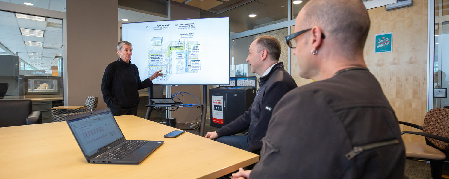 UCalgary researchers in a meeting room.