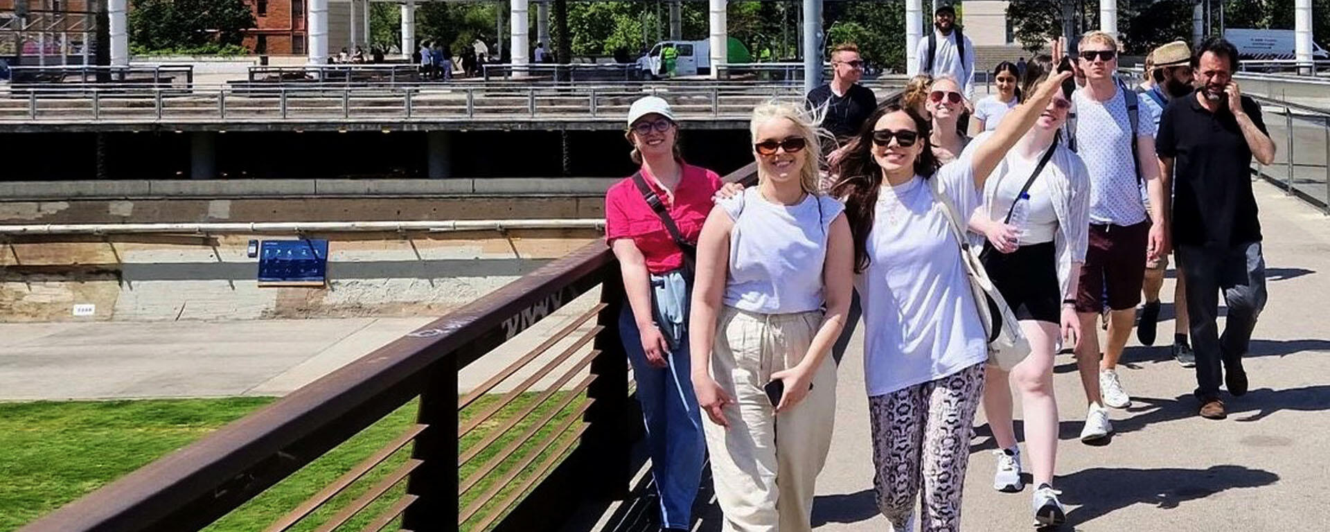 SAPL students posing for a picture, smiling, in Barcelona