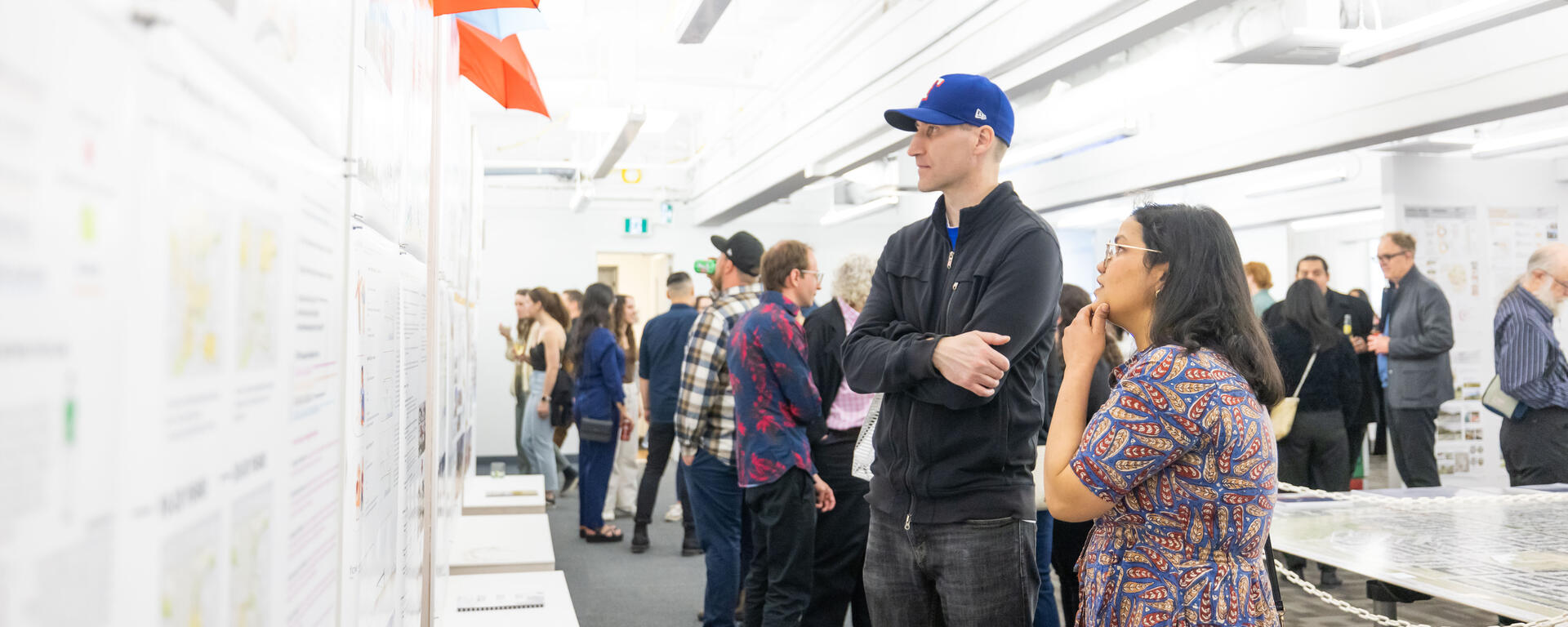 Students looking at other student work