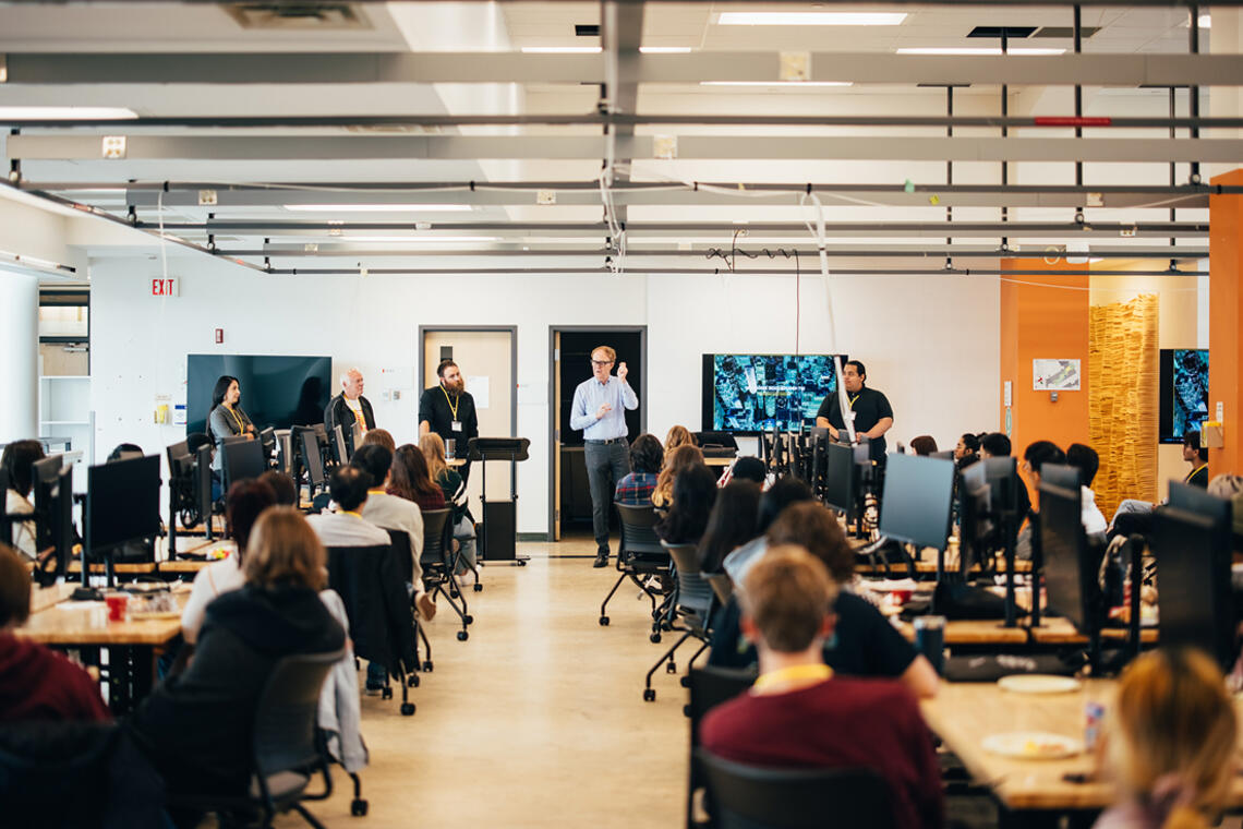 Dean John Brown speaking to students