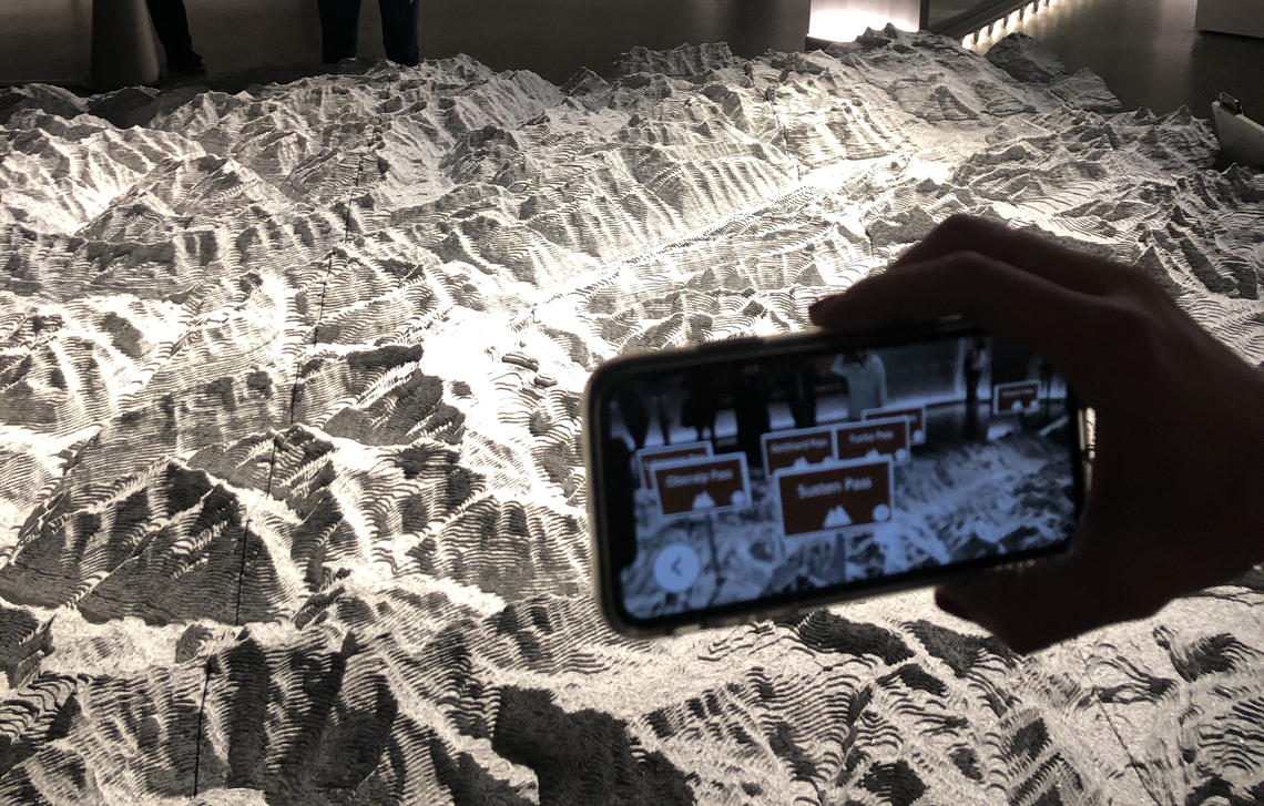 A granite model of the Alps with augmented reality at the Landesmuseum with a ultra realistic statue of modern Helvetia