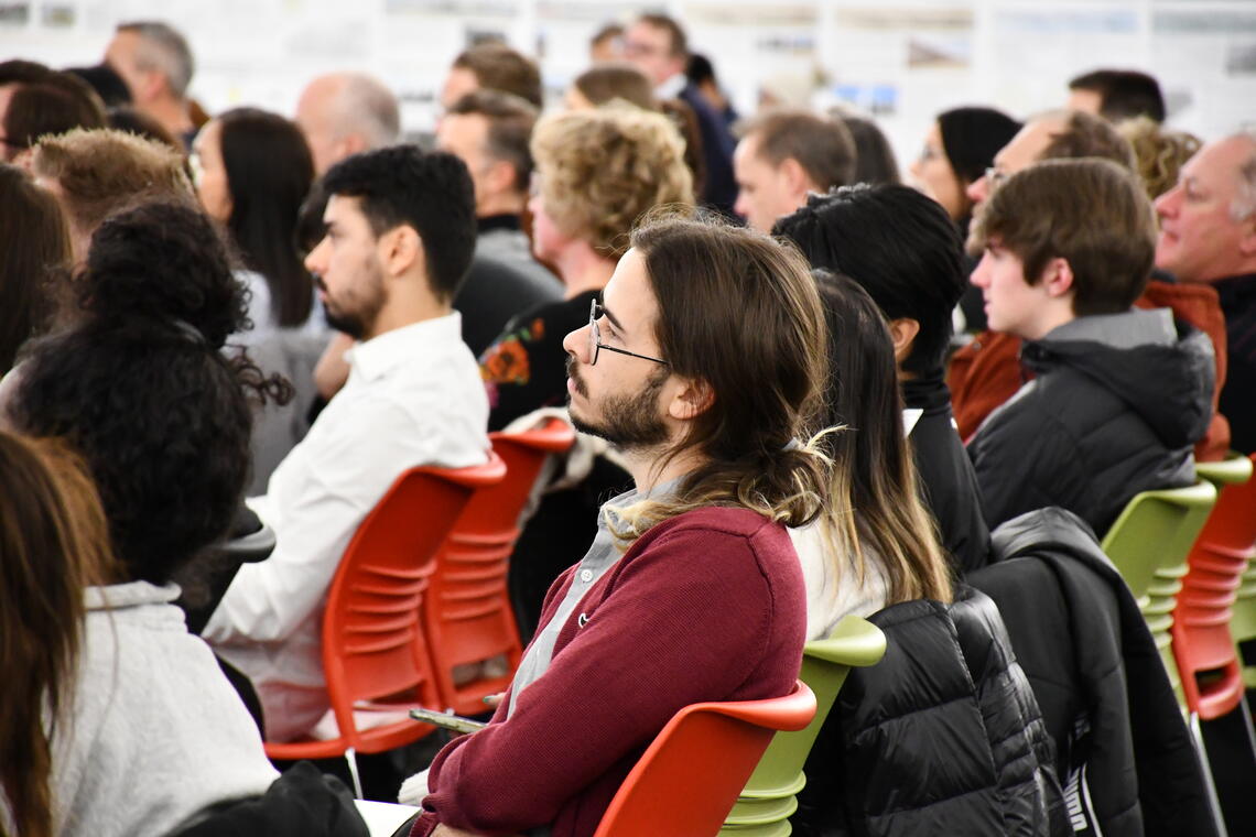 Student sitting, listening to a lecture