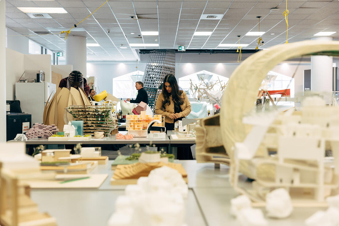 People exploring student work at SAPL